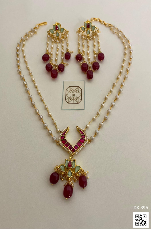 Ira Ruby Pearl Kundan Pendant Necklace Set
